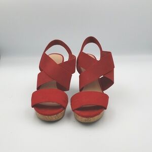 American Eagle Wedge Sandals, women's size 5, red straps and corkboard siding.